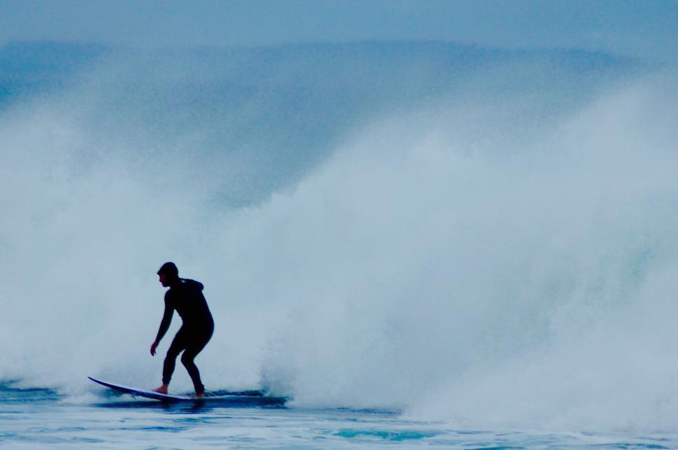 Free Image of A person on a surfboard 