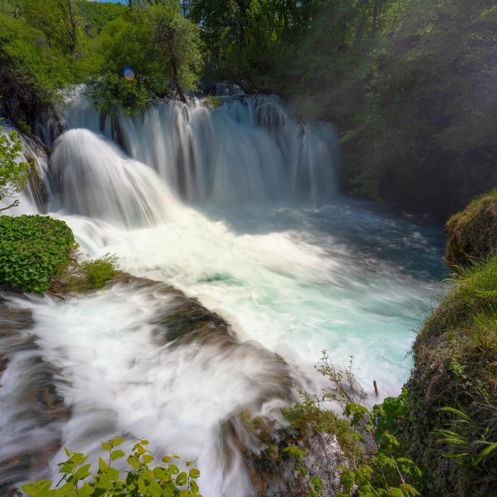 Free Image of A waterfall in a forest 