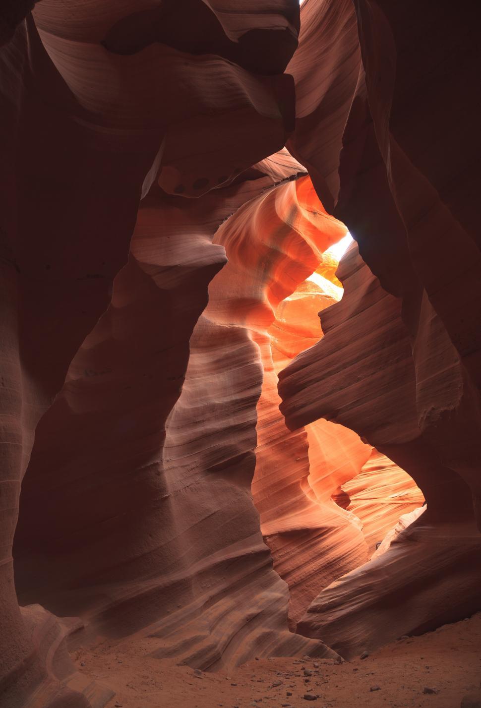 Free Image of A cave with light coming through 