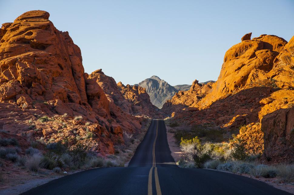 Free Image of A road through a rocky canyon 