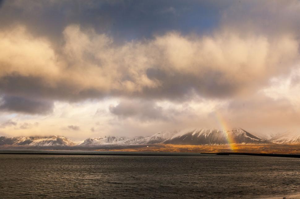 Free Stock Photo of A rainbow over a body of water