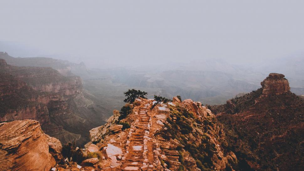 Free Image of A rocky mountain with a view of the canyon 
