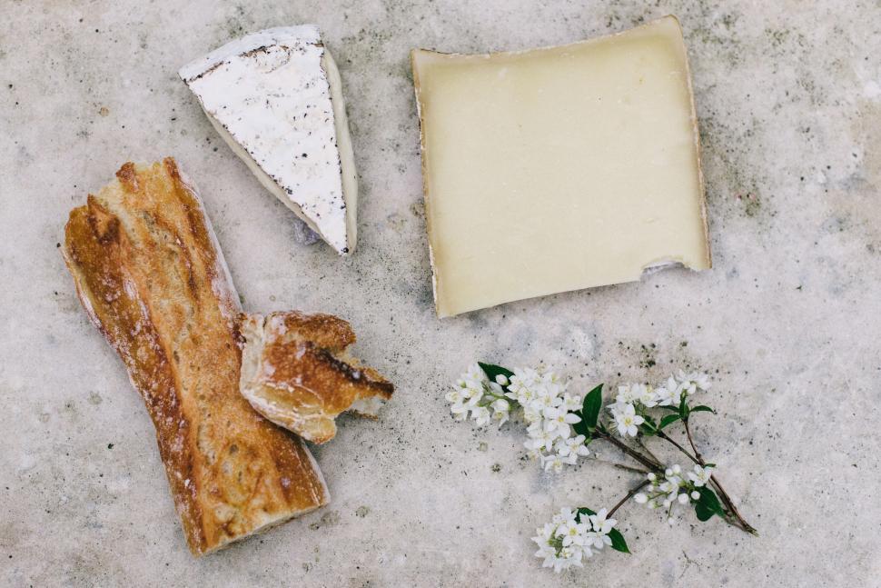 Free Image of A group of cheeses and bread 