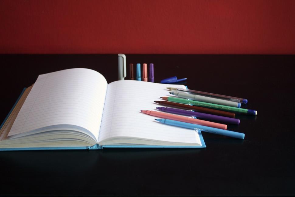 Free Image of Open Book on Table 