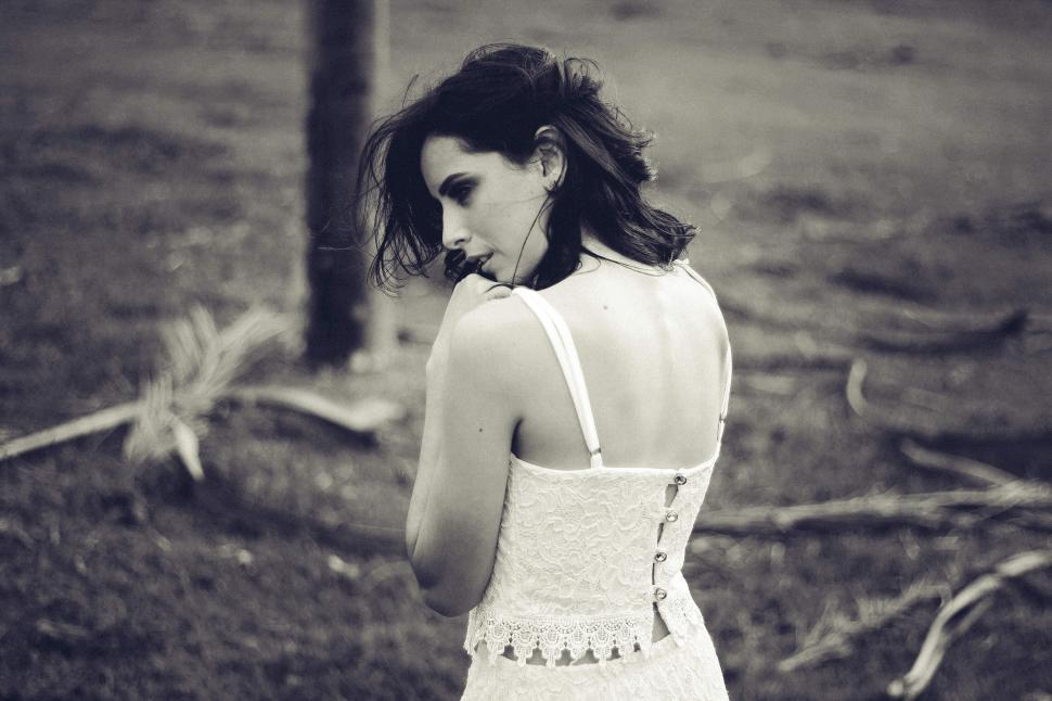 Free Image of A woman in a white dress 