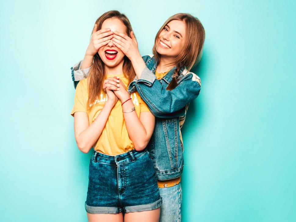 Free Image of Two women standing next to each other 