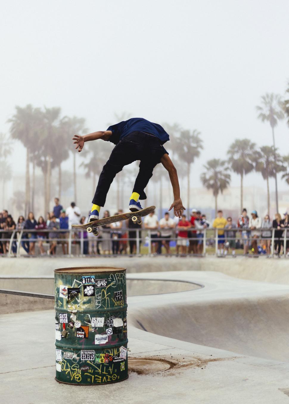 Free Image of A person jumping on a skateboard 