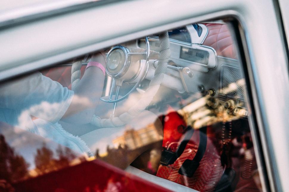 Free Image of A person driving a car 