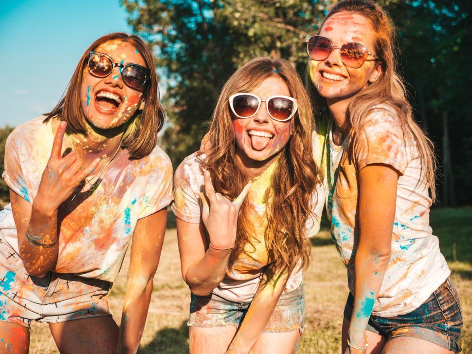 Free Image of A group of women posing for a picture 