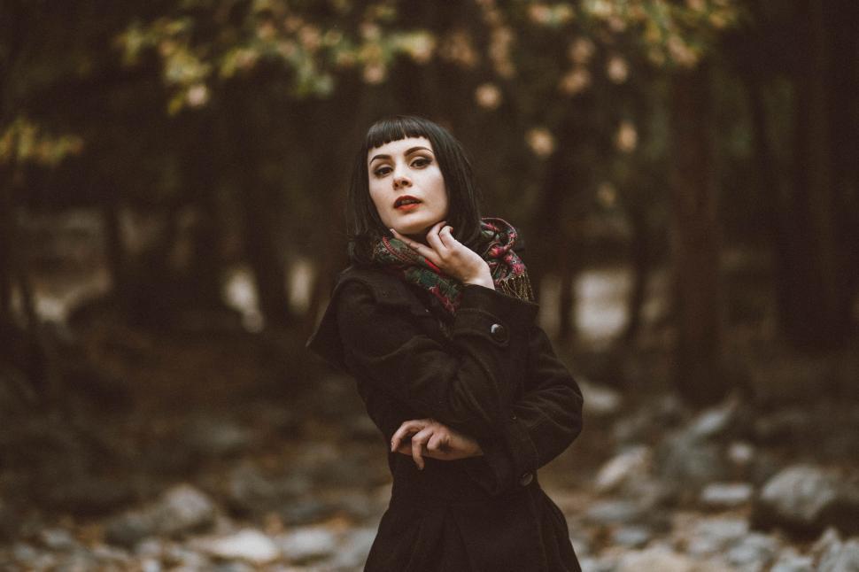 Free Image of A woman in a black coat 