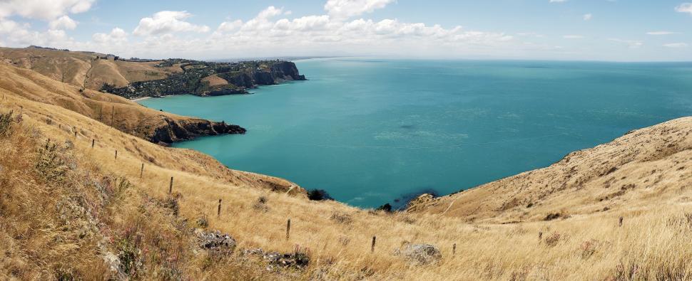 Free Image of Breathtaking coastal view from grassy hills 