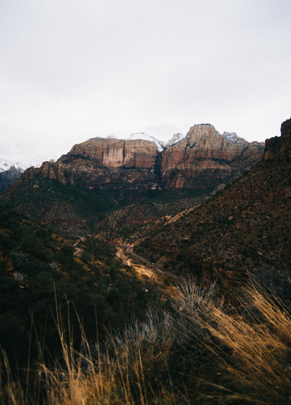 Free Image of Majestic mountain view with cloudy sky 