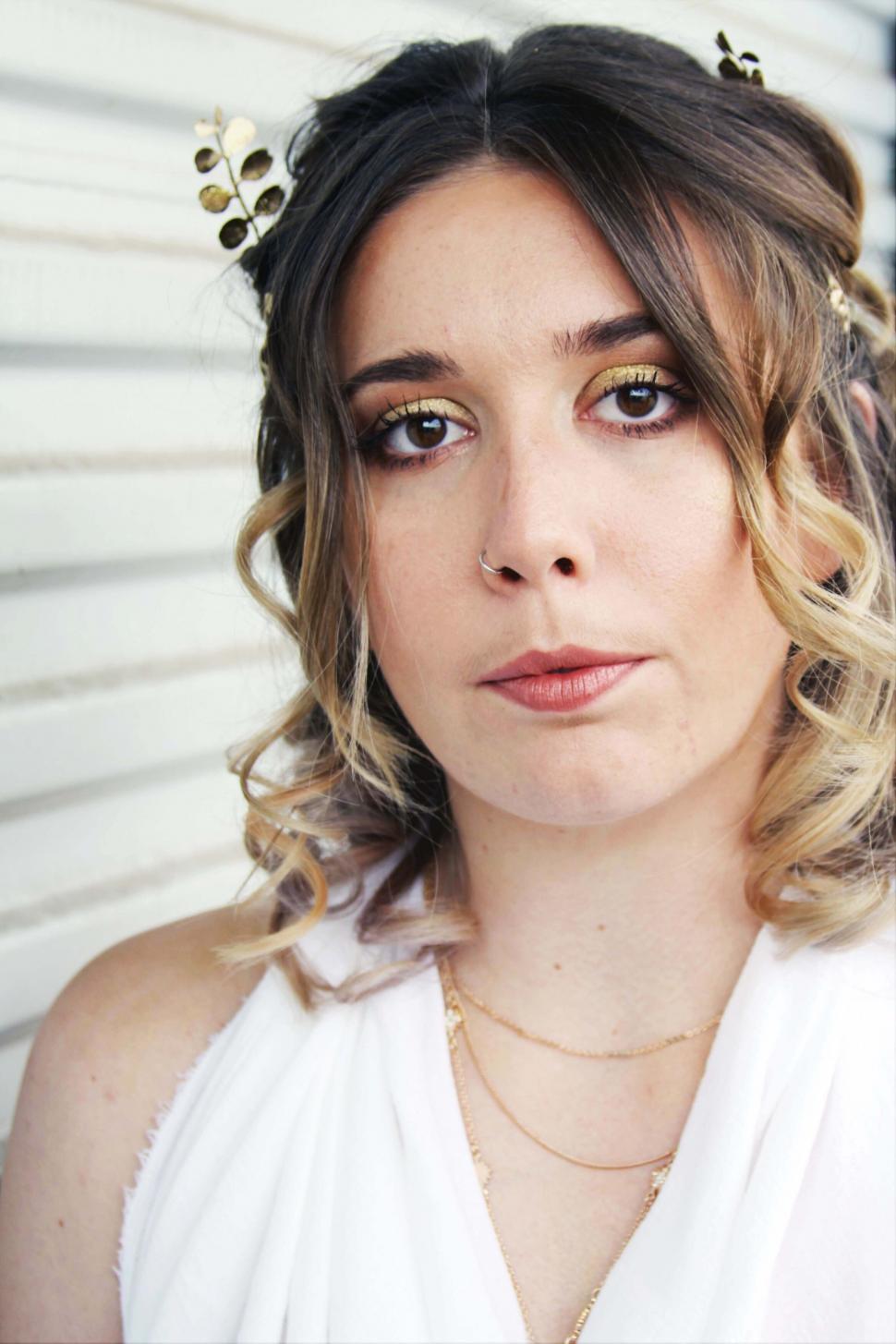 Free Image of Elegant woman with creative hair accessories 
