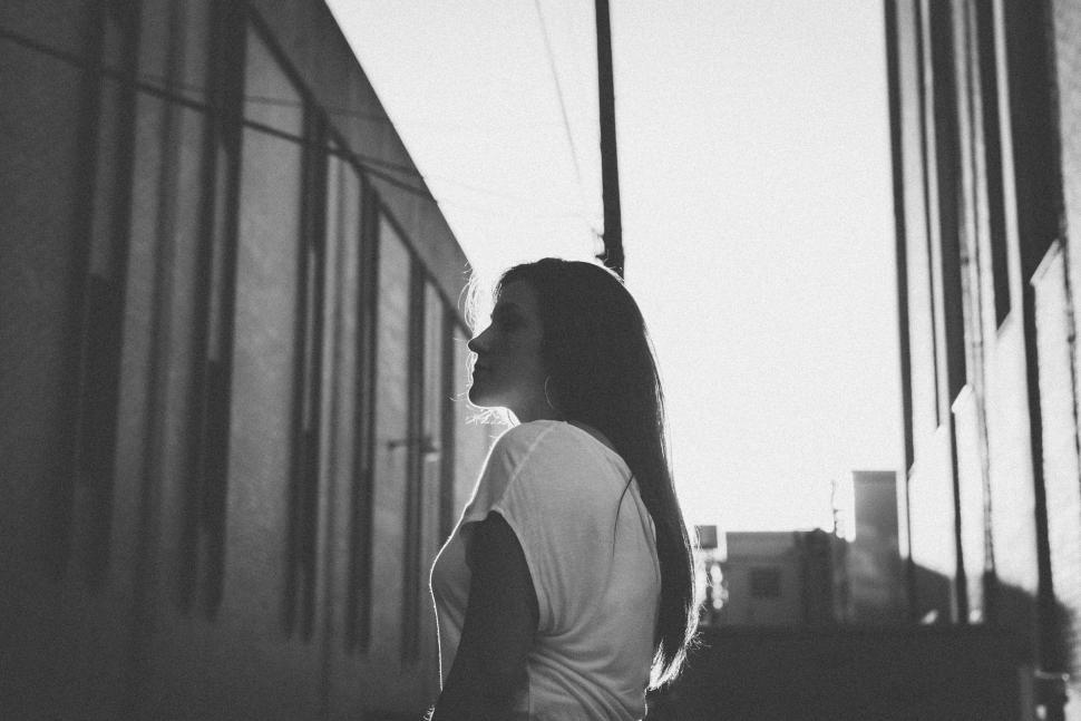 Free Image of Urban Girl in a Black and White Cityscape 