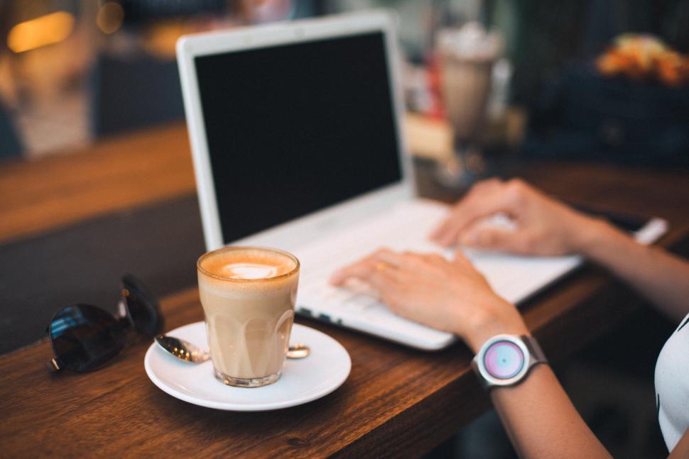 Free Image of Laptop work in a caf? with cappuccino 