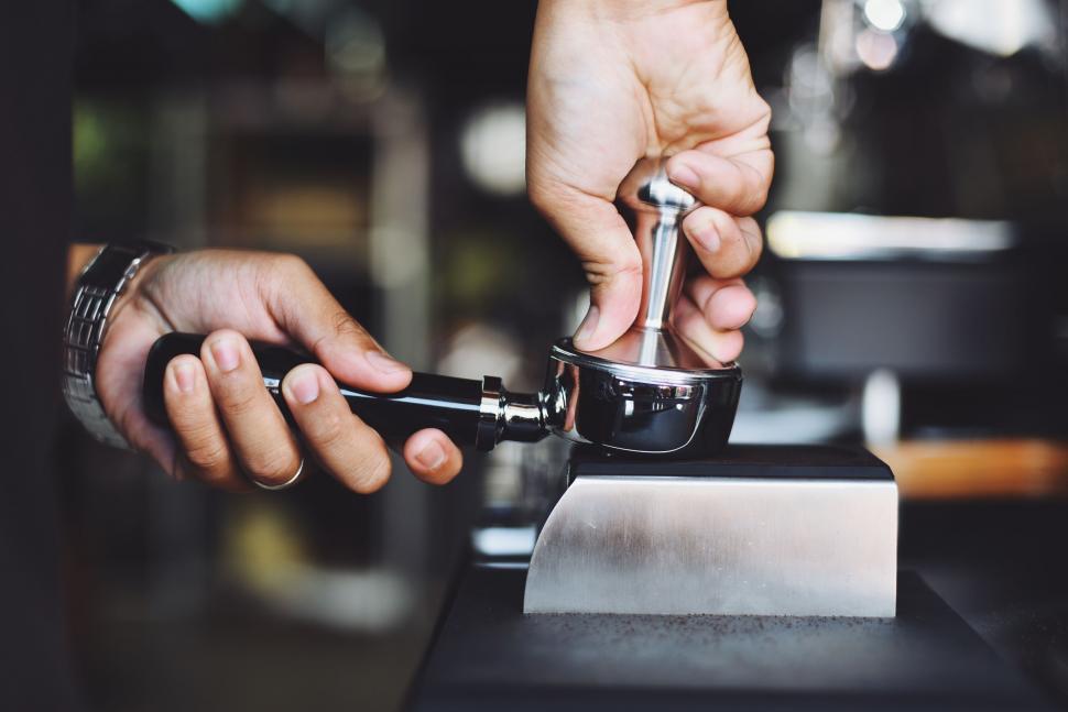 Free Stock Photo of Barista tamping coffee grounds Download Free