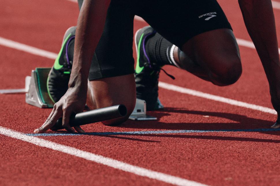 Free Image of Sprinter at starting blocks in a race 