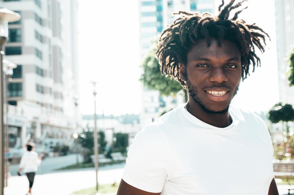 Free Image of A man smiling at the camera 