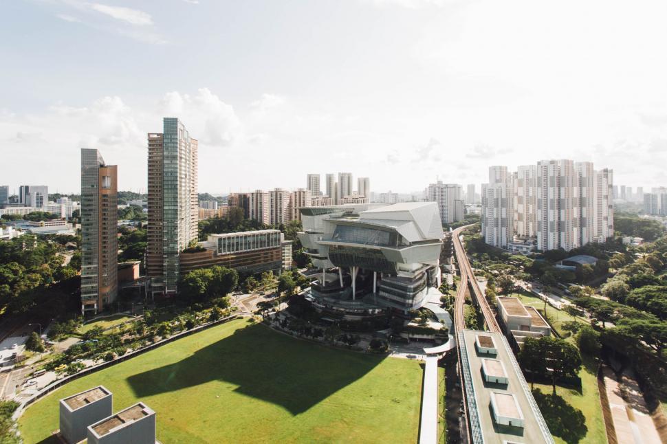 Free Image of Urban landscape with modern buildings and park 