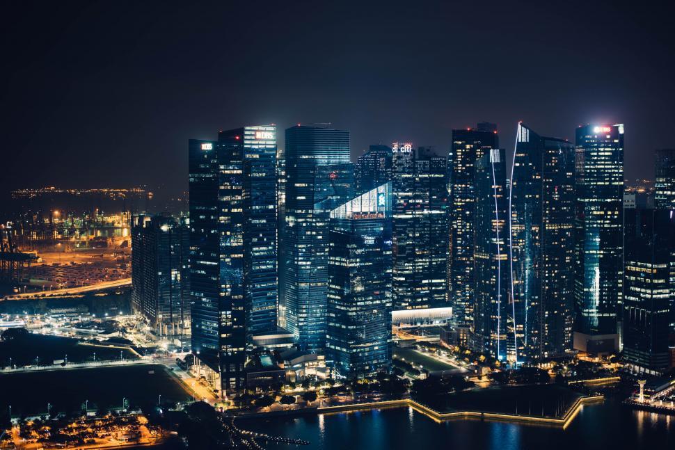 Free Image of Night City Skyline with Illuminated Skyscrapers 