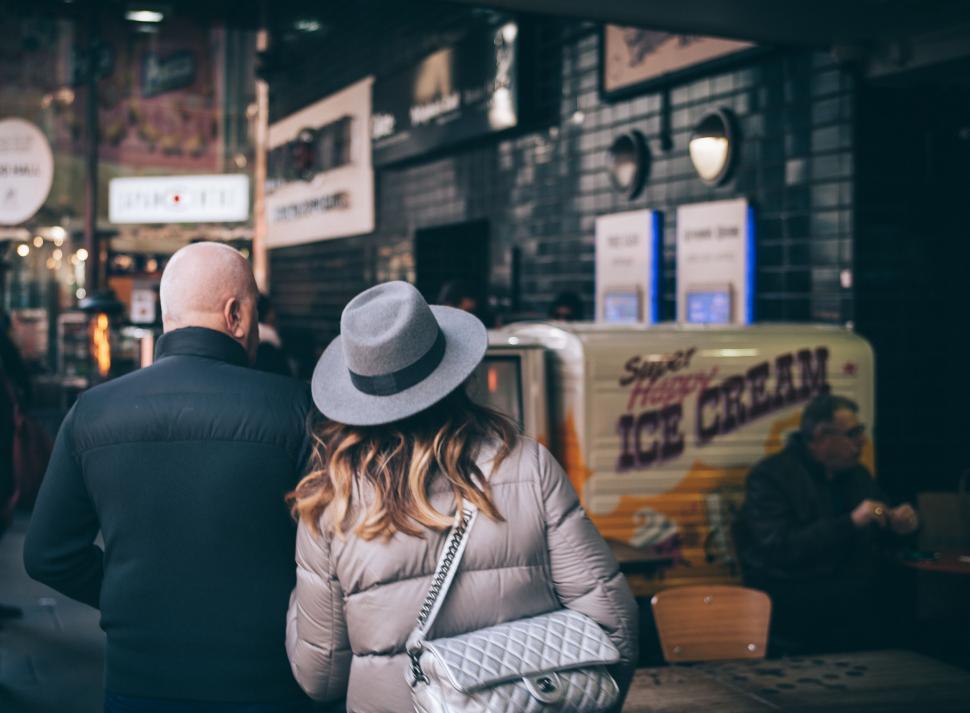 Free Image of Back View of Strolling Couple in City 