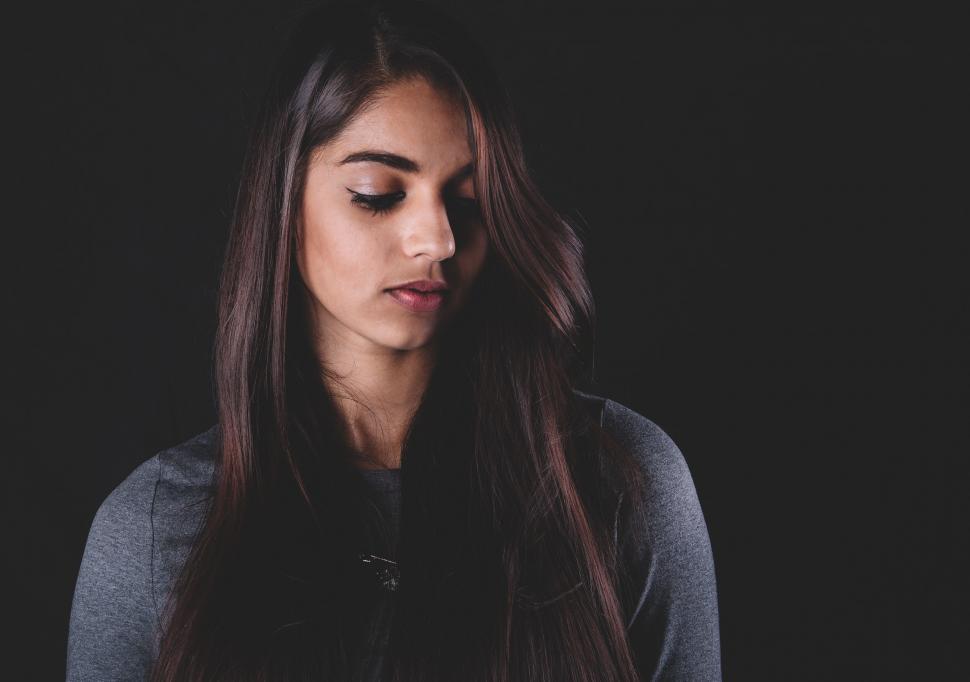 Free Image of Serene young woman with long hair 