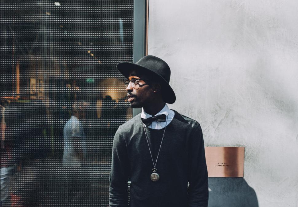 Free Image of Stylish man posing in urban setting 