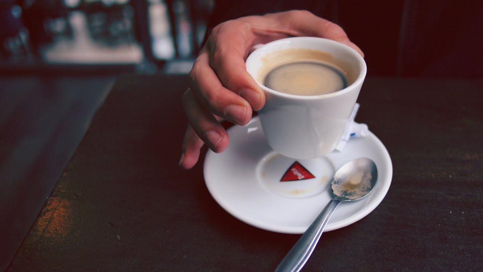 Free Image of Cup of coffee with a dessert on table 