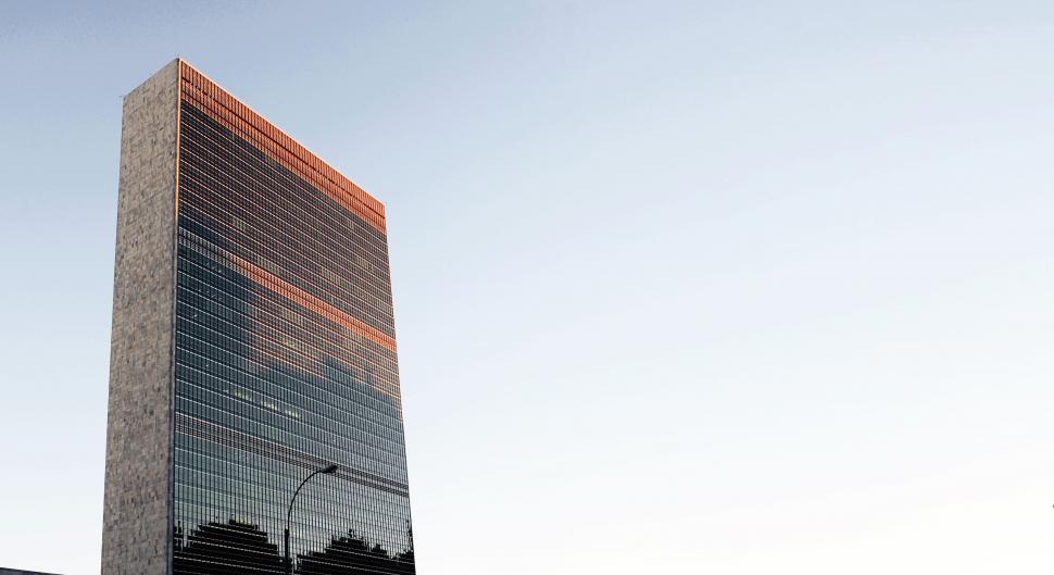 Free Image of Modern Skyscraper Against a Clear Blue Sky 