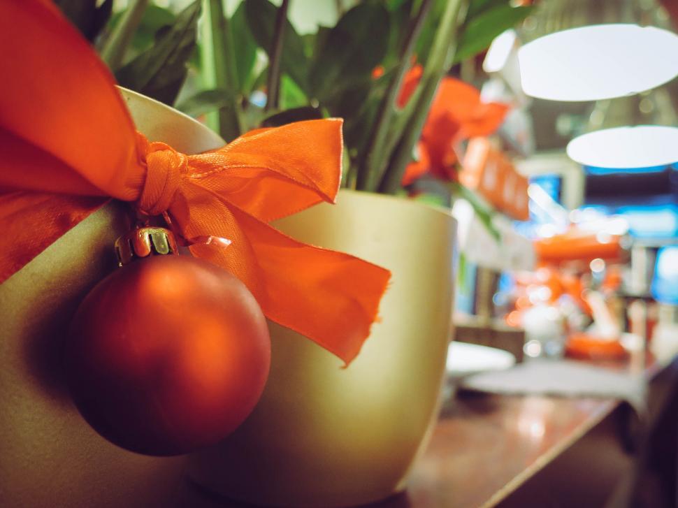 Free Image of Christmas scene with gift and decor 