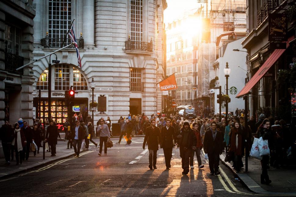 Free Image of Sunset scene with people on city street 
