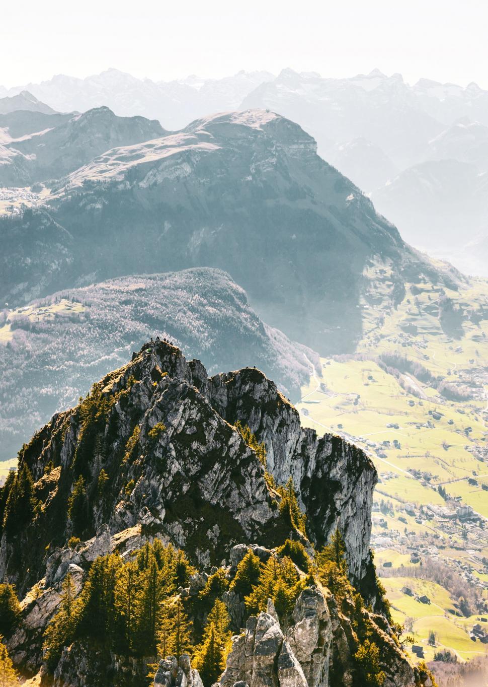 Free Image of Rocky mountain peak overlooking a valley 