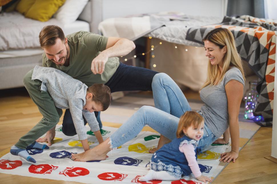 Free Image of Playful family game night members 
