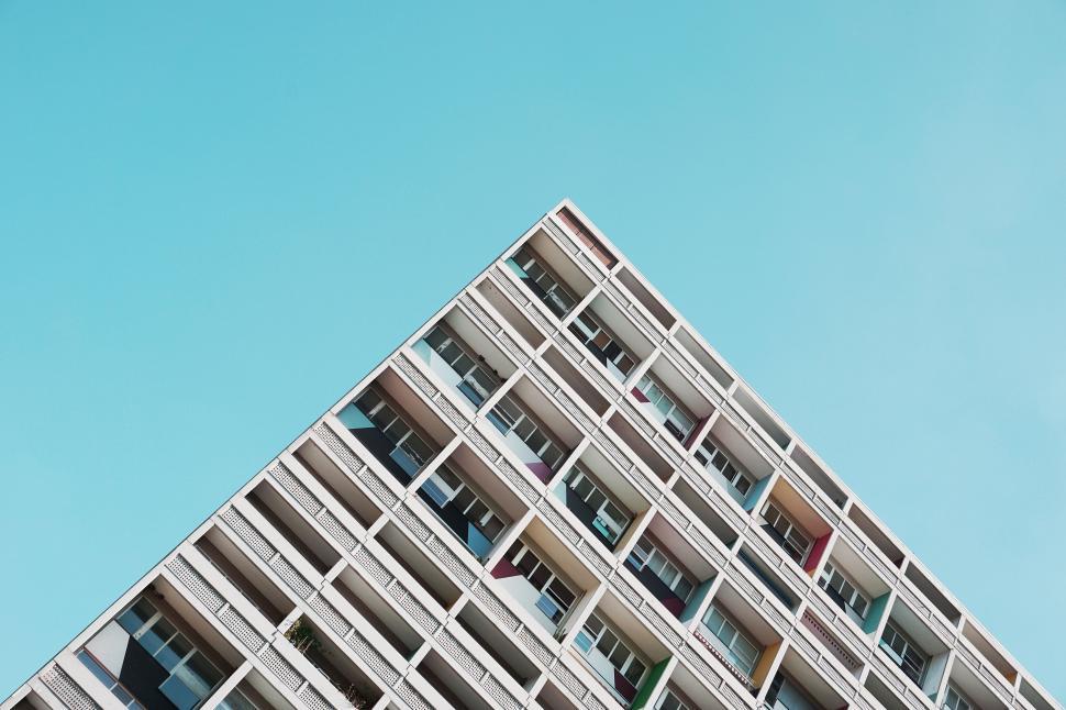 Free Image of Looking up at a colorful apartment building 