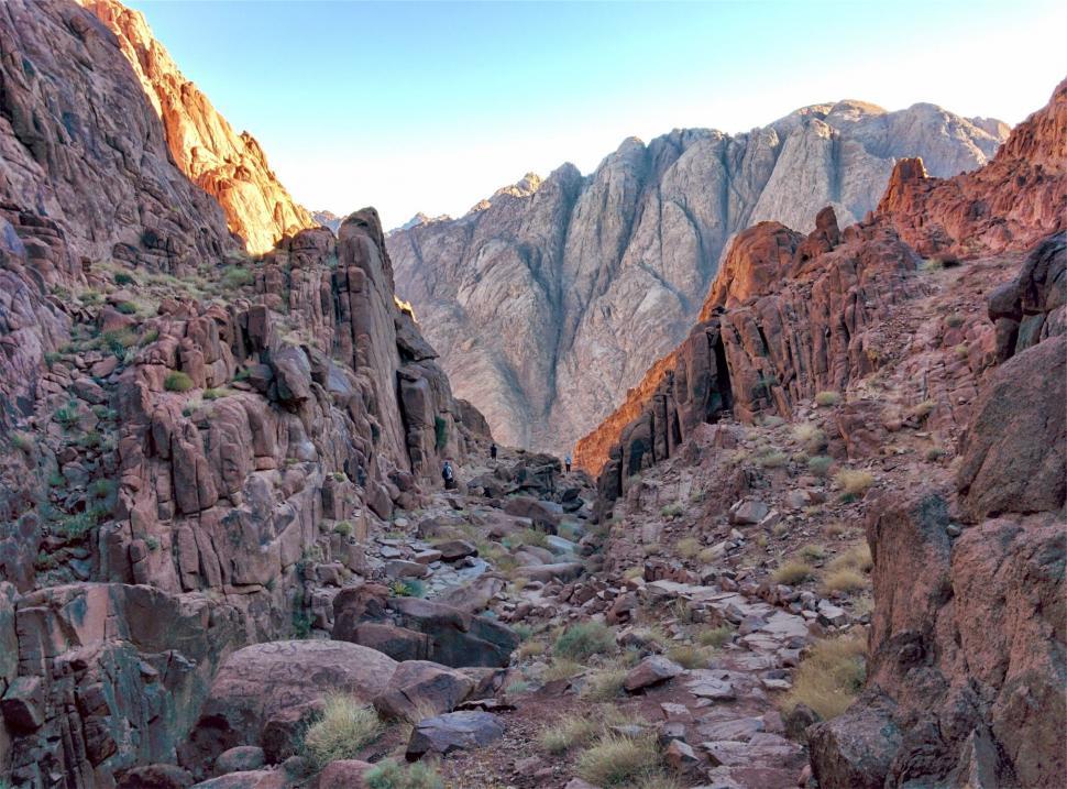 Free Image of Rocky desert canyon under clear blue sky 