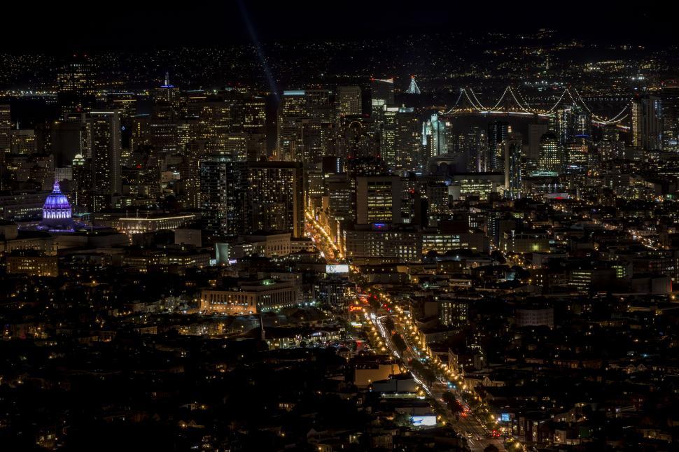 Free Image of Nighttime cityscape with illuminated buildings 