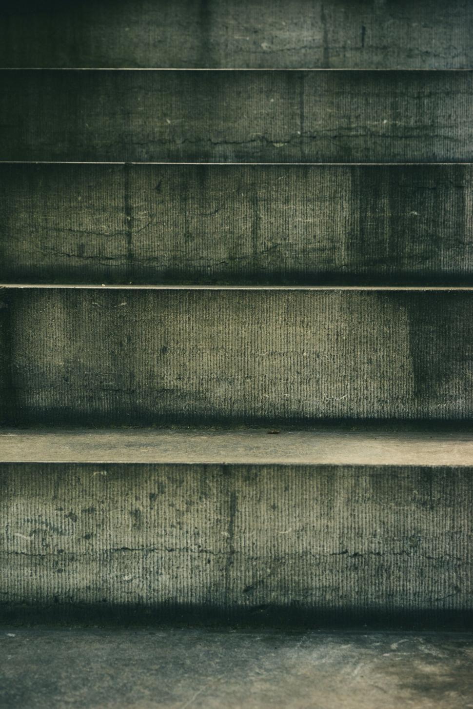 Free Image of Concrete staircase in moody lighting 