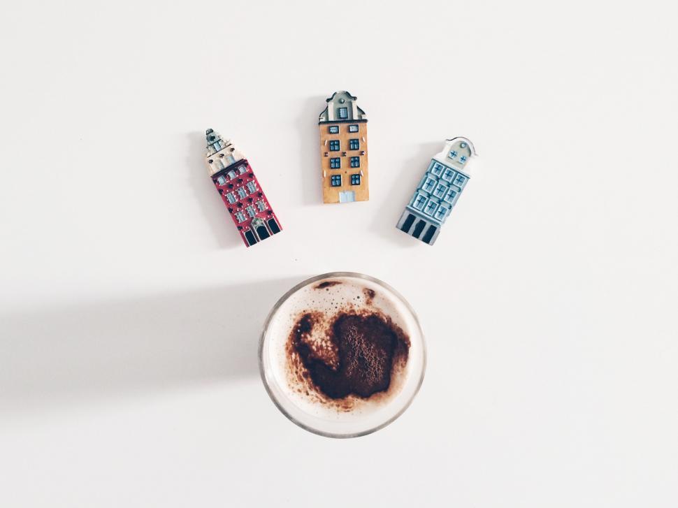 Free Image of Miniature houses and coffee cup with heart foam 