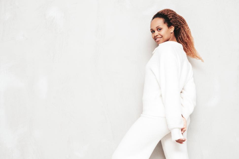 Free Image of A woman in white outfit 