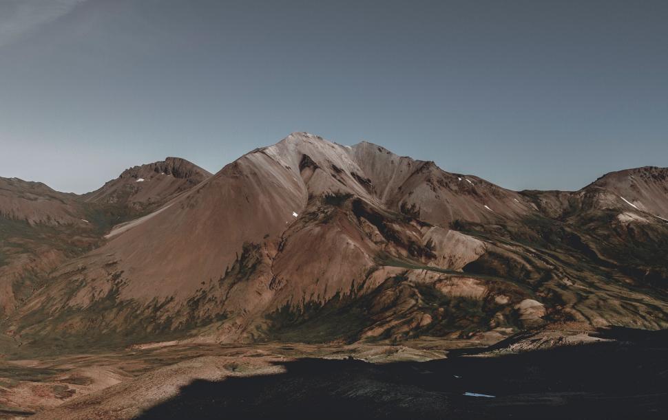 Free Image of Majestic mountain landscape under clear blue skies 