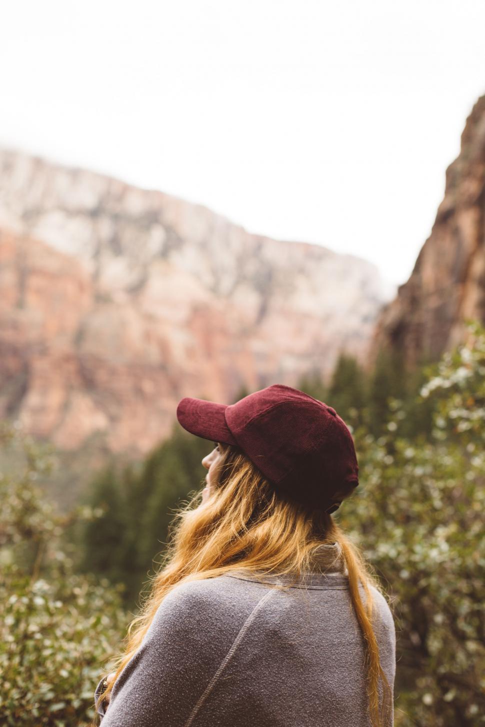 Free Image of Woman gazing at mountain landscape 