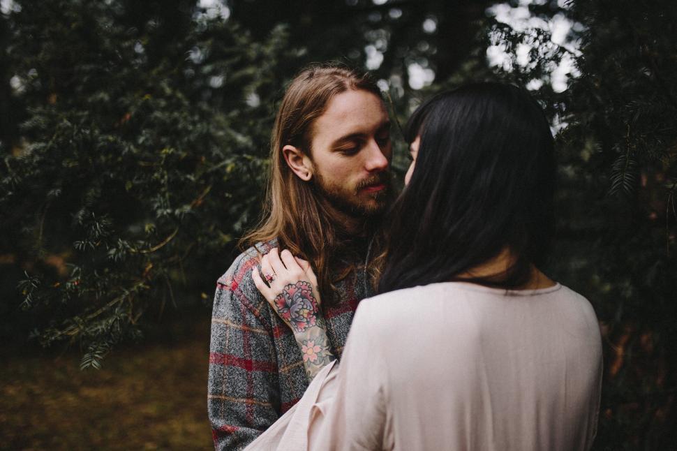 Free Image of Romantic couple embracing in a forest 