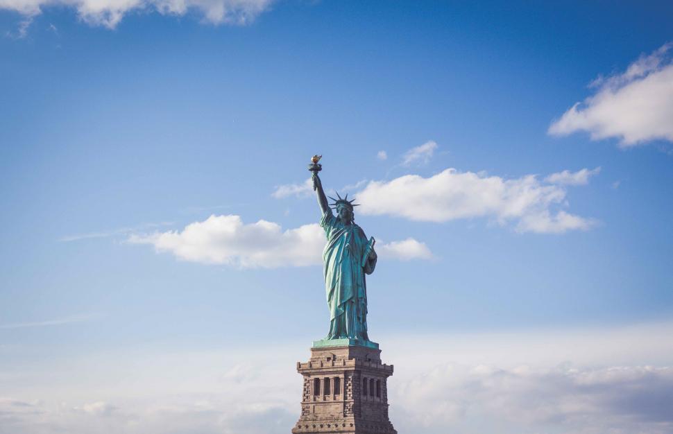 Free Image of Statue of Liberty against blue sky 