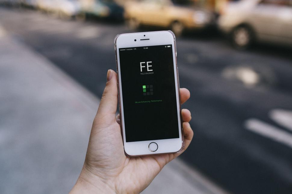 Free Image of Hand holding a smartphone with battery icon 