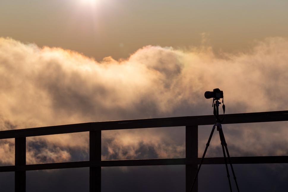 Free Image of Camera Silhouette Against Sunrise Hues 