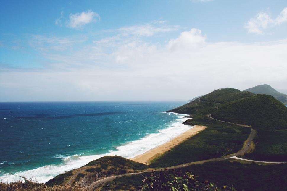 Free Image of Scenic coastal landscape with lush greenery 
