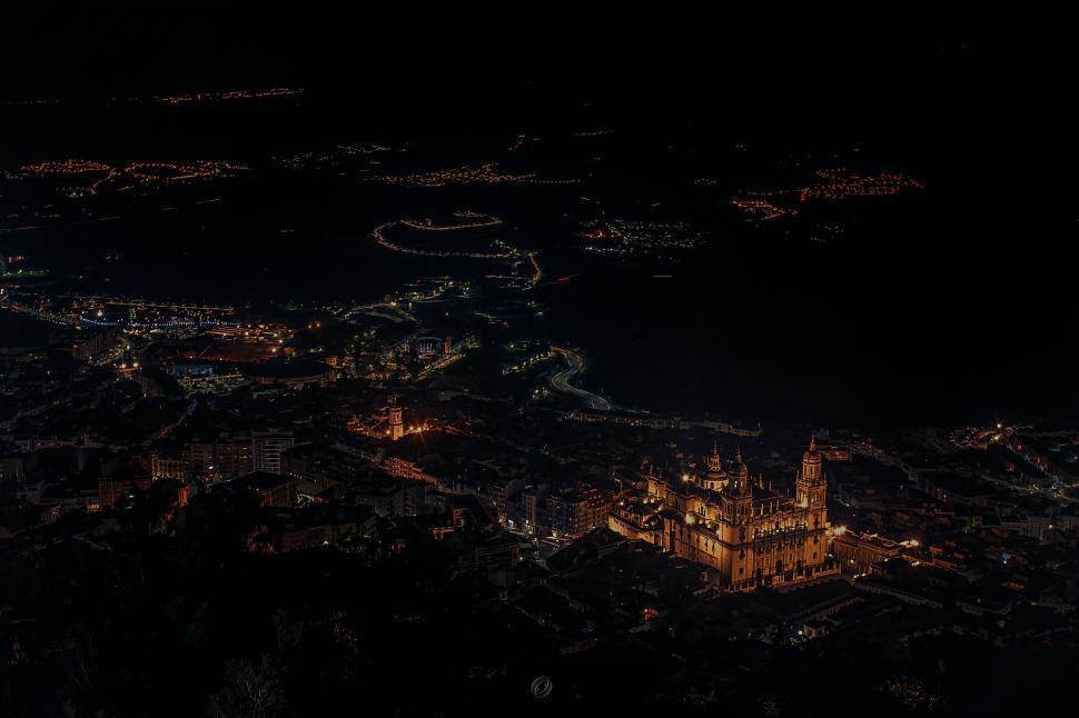 Free Image of Aerial night shot of a cathedral city 
