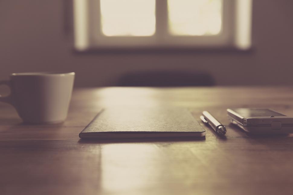 Free Image of Vintage desk with coffee and modern gadgets 