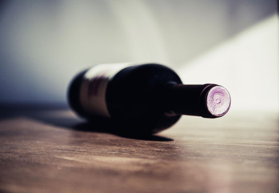 Free Image of Artistic wine bottle in dramatic lighting 