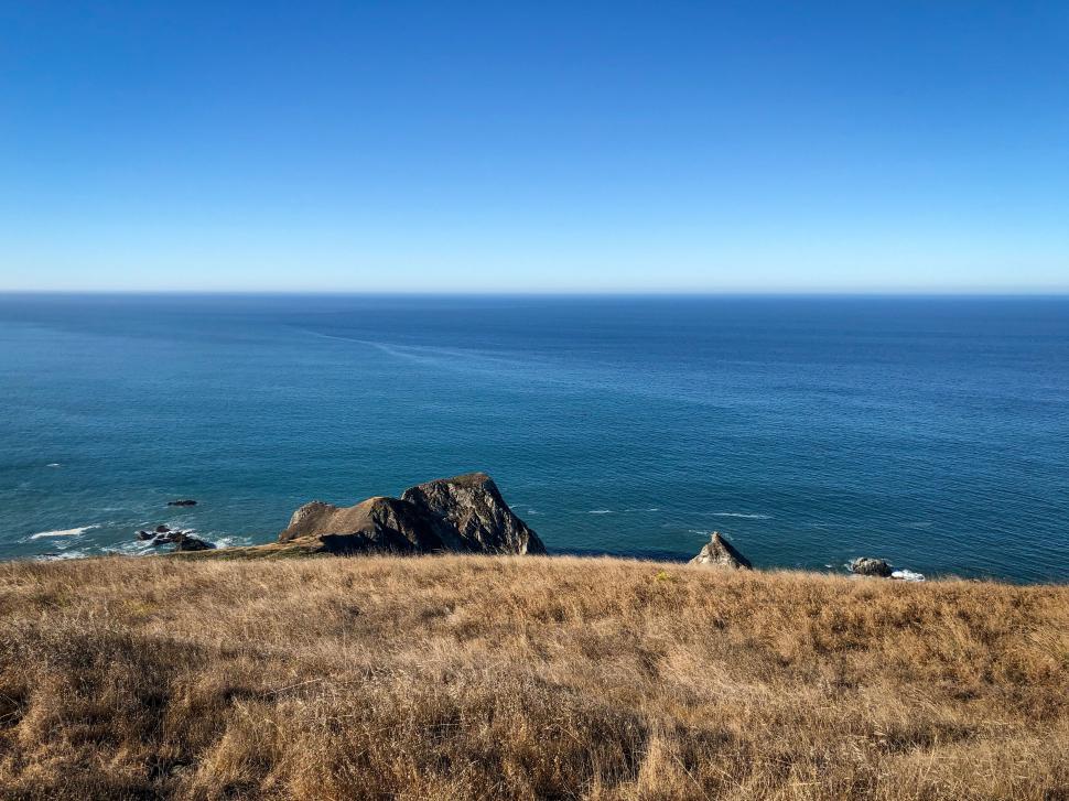 Free Stock Photo of Cliffside coastal view with blue ocean | Download ...